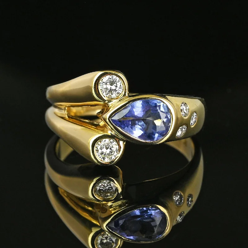 Fine Diamond Pear Cut Tanzanite Modernist Ring in 14K Gold