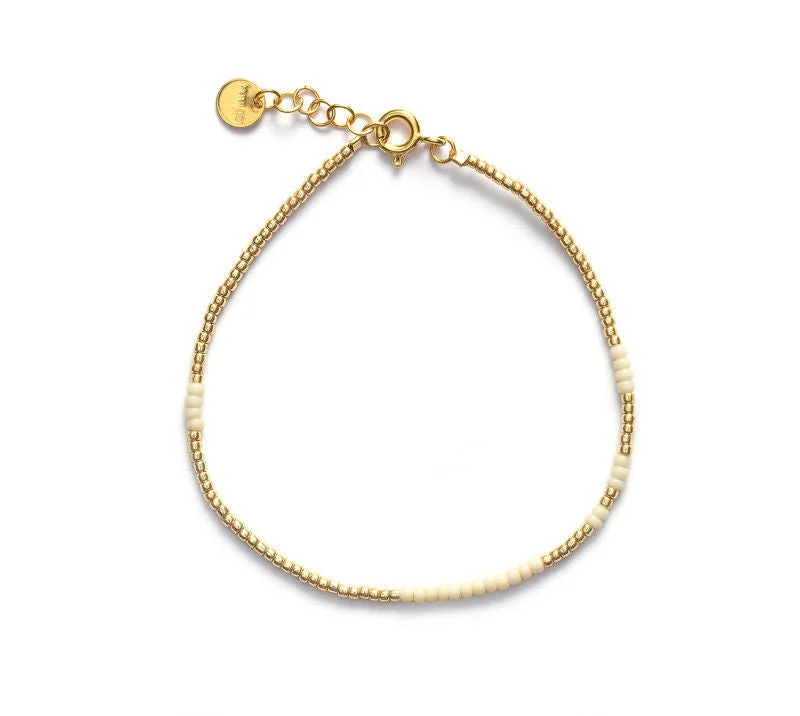 Trending Jewelry Now At Unbeatable Prices Asym Gold Plated Bracelet w. Ecru Beads