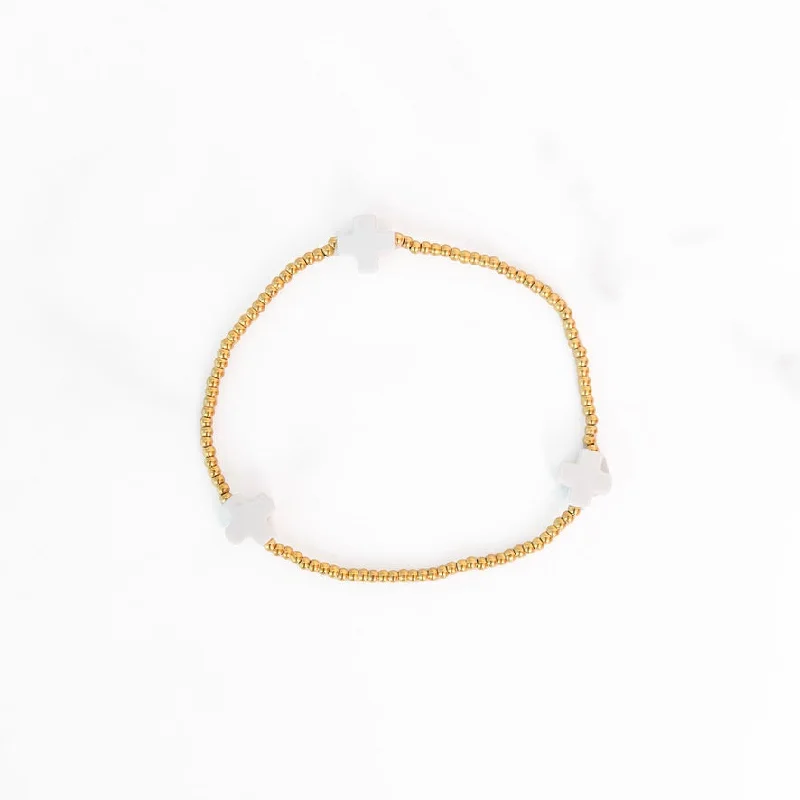 Your Perfect Accessory At The Perfect Price Gold Beaded White Cross Bracelet