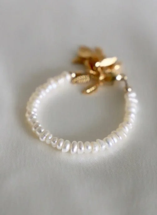 Chic And Stylish Jewelry At Exclusive Prices WHITE PEARL BABY BRACELET