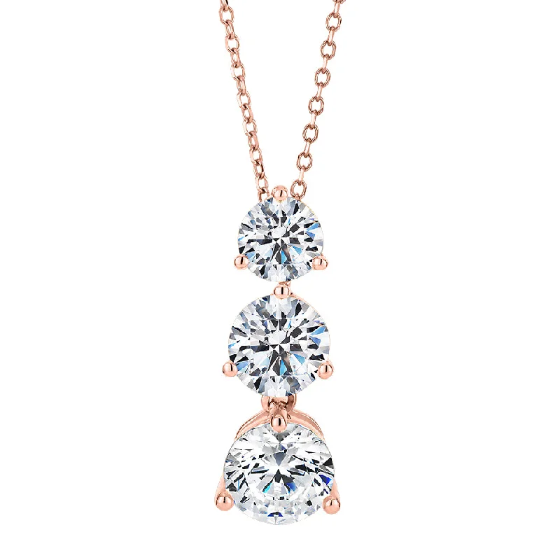 Three stone drop pendant with 2.33 carats* of diamond simulants in 10 carat rose gold